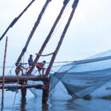 Fishermen pulling in net