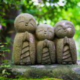 Little statues in Japanese garden