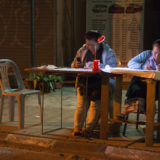 People selling Tickets in Vang Vieng