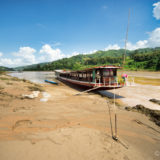 Our Longboat at the shore of the Mekong