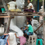 Workers making new budha statue