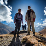 Standing between mountains and clouds