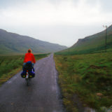 Girl cycling at the Isle of Mull