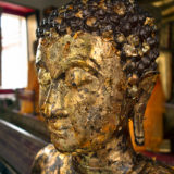 Gold leafes on a Budda statue, Wat Pho