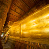 Large golden Budda statue in temple