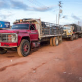 Trucks waiting on the ferry of the Orinoco